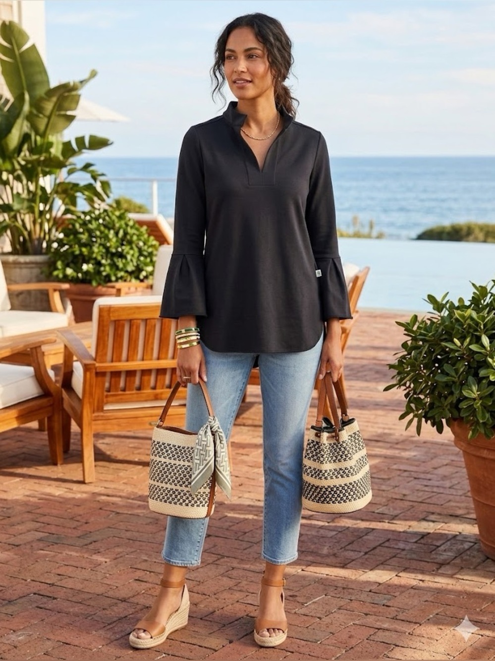 Dudley Stephens Black tunic top featuring bell sleeves and a split v-neck SzM